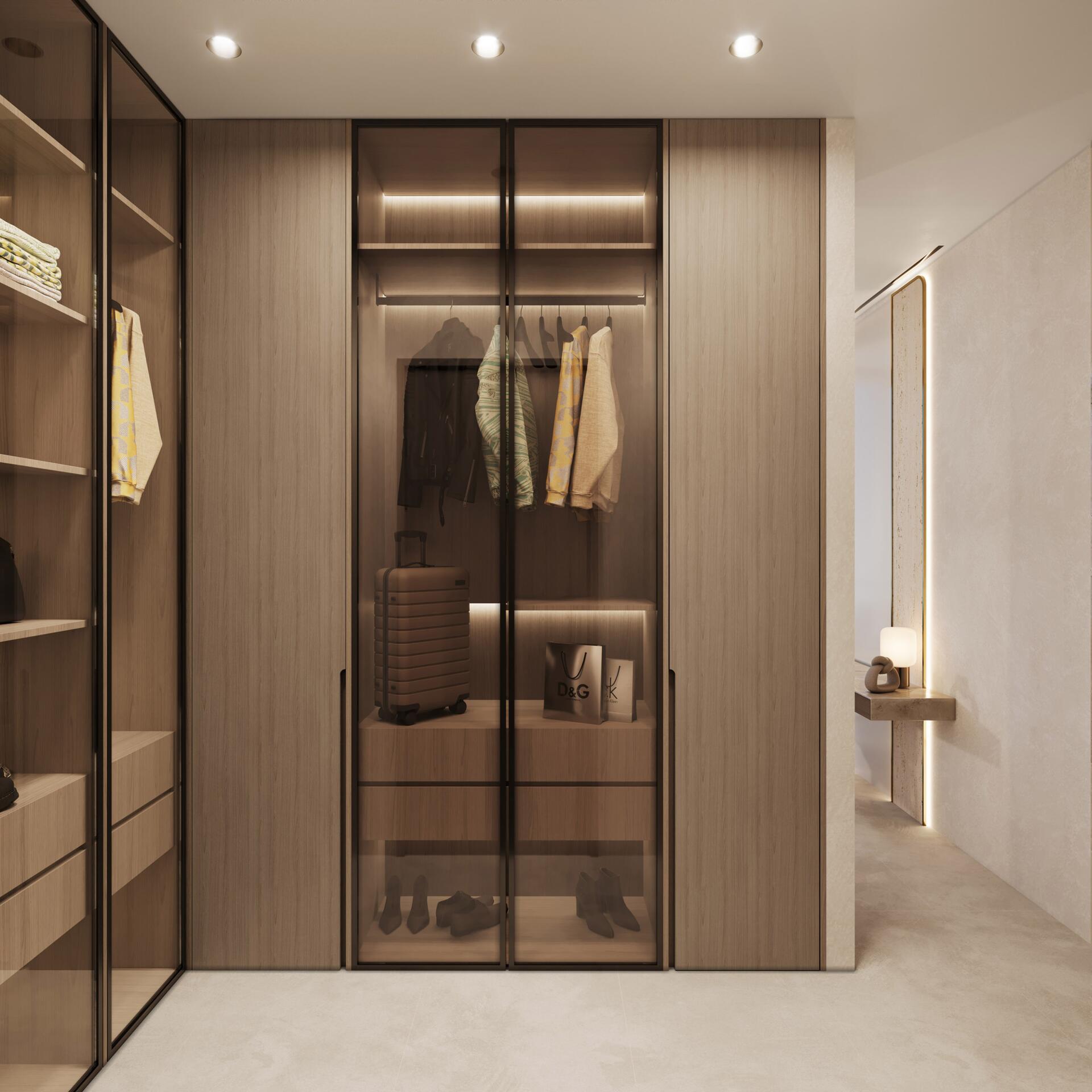 Walk-in closet with glass-front wardrobes and LED lighting