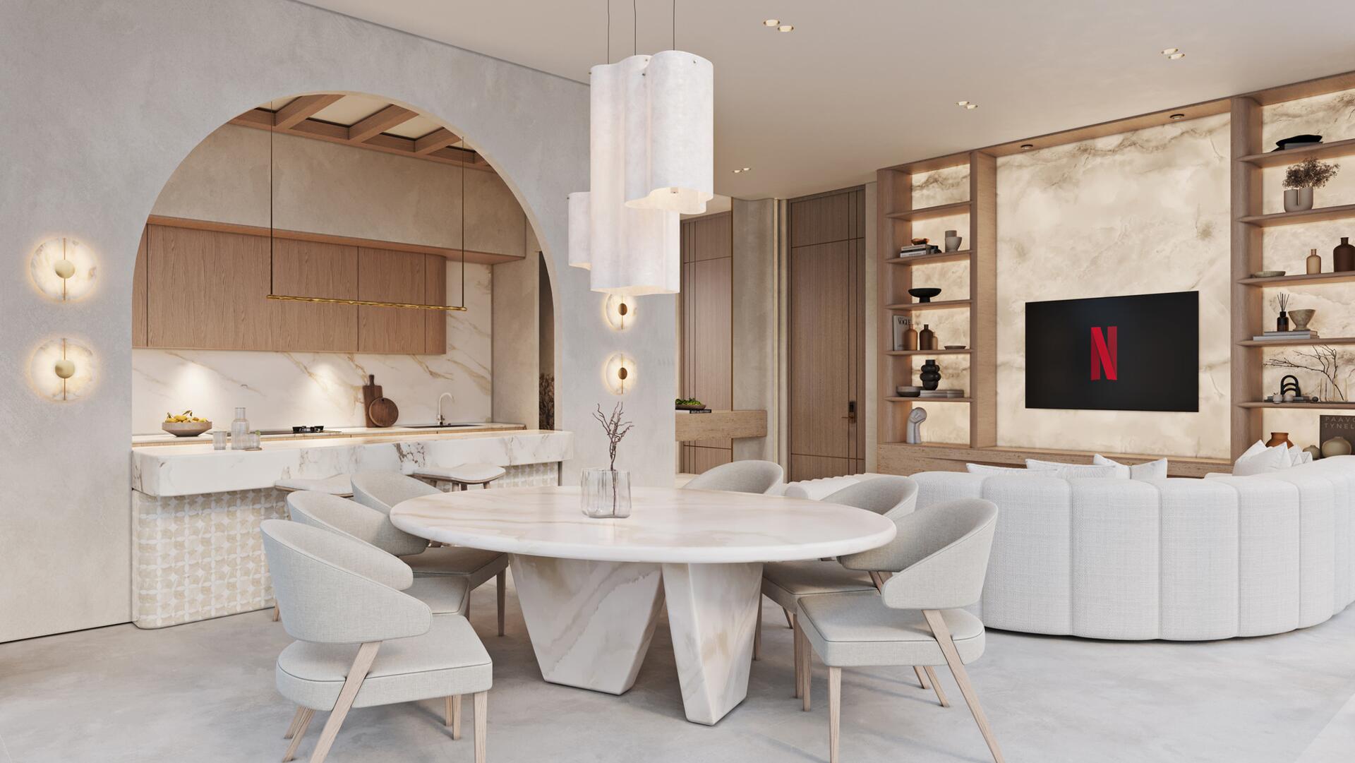 Open-plan living and dining area with arched kitchen